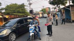 250 Bendera Merah Putih Dibagikan ke Warga, AKP Parsa : Kobarkan Semangat Kemerdekaan